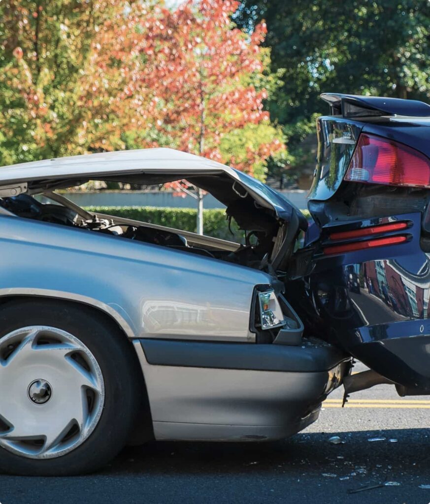 Rear-end car crash with a green background