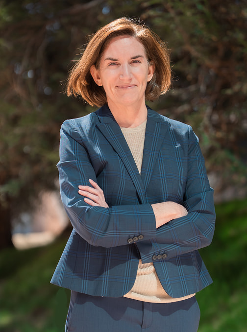 Profile photo of Greta Katz standing outside against a nature background