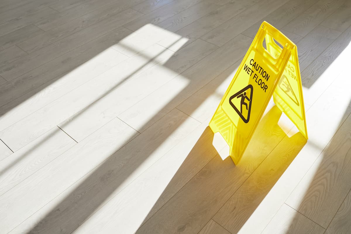 Yellow caution wet floor sign