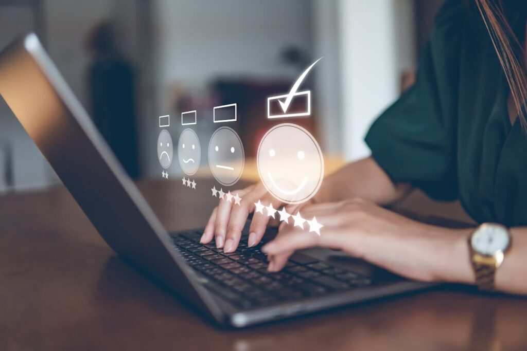 Woman giving customer feedback on a computer