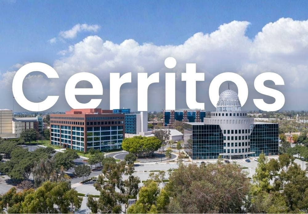 Aerial view of Cerritos, California featuring the Cerritos City Hall and surrounding office buildings.